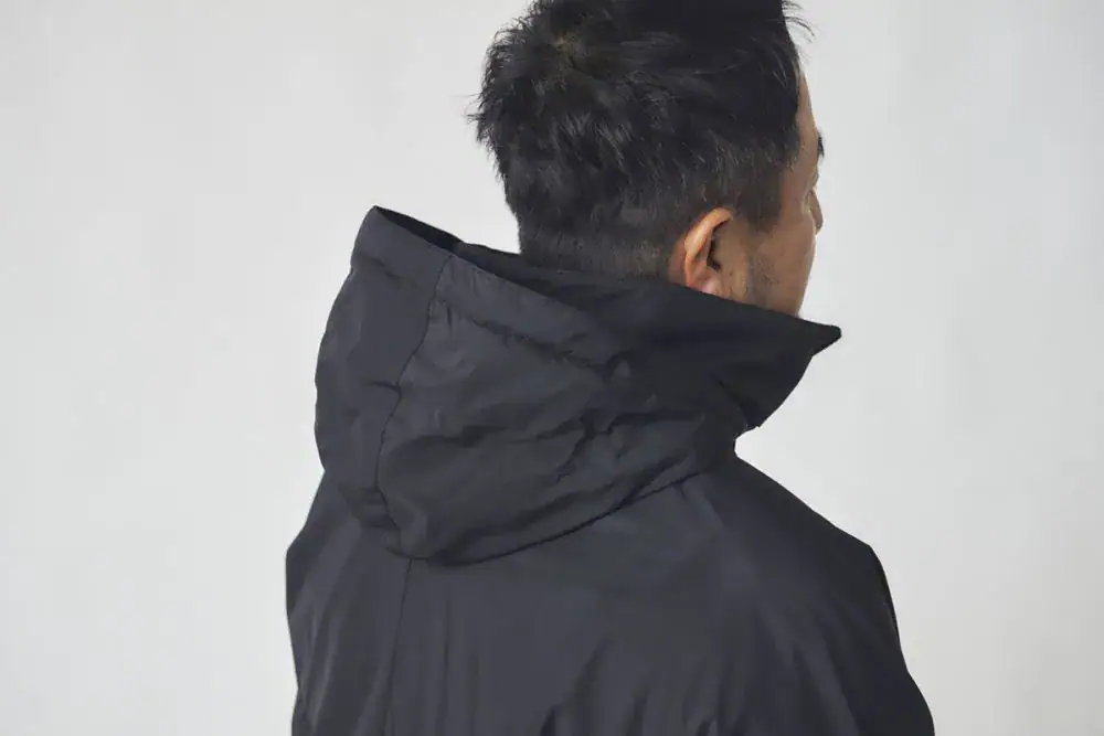 ニューバランス ブラックアウト フィールドパデッドコート