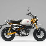 レトロなミニバイクとオレンジ仕上げのフレーム.