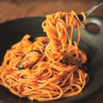 細麺パスタはソースがよくからむし、揚げナスも美味しくて完成度が高い