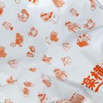 「楽天ラクヨコ」のロゴ入りビニール袋