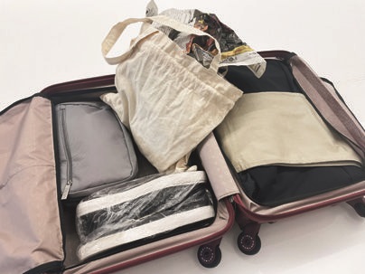 スーツケースのパッキング術：行きの荷物は70％隙間には新聞を詰める